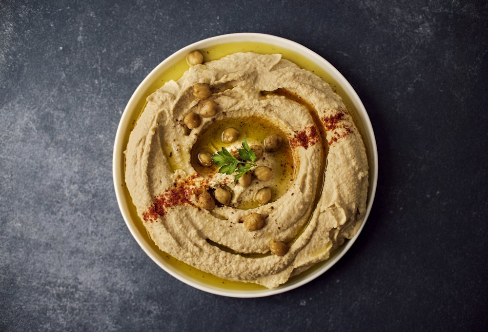 Stock photo of a bowl of hummus